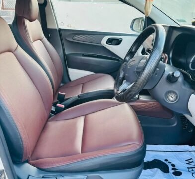 Hyundai Aura cabin with front seats