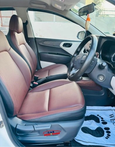 Hyundai Aura cabin with front seats